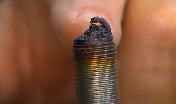Build up carbon  on the spark plug's electrodes